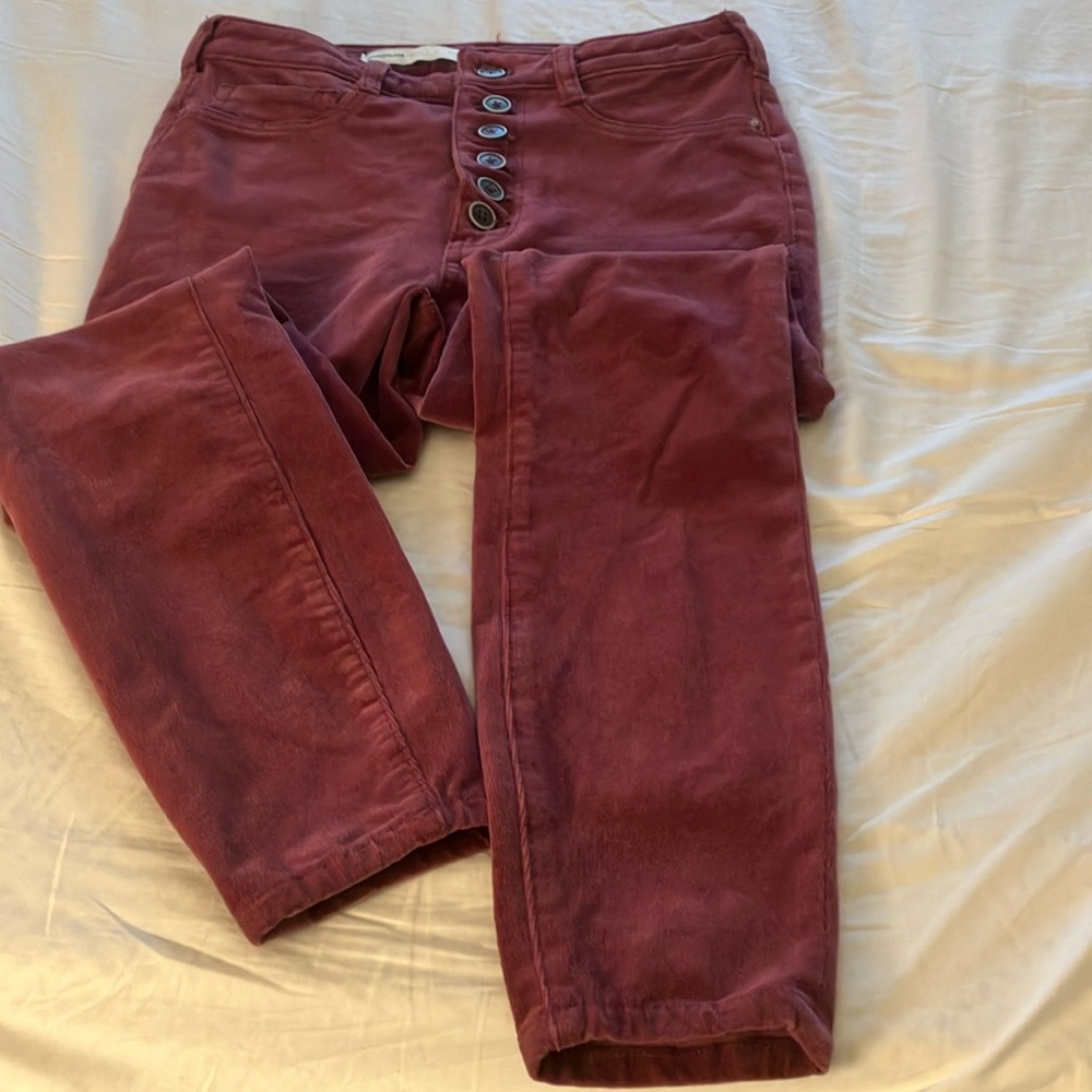 Anthropology mulberry color button front jean legging. Stretch legging. Size 27